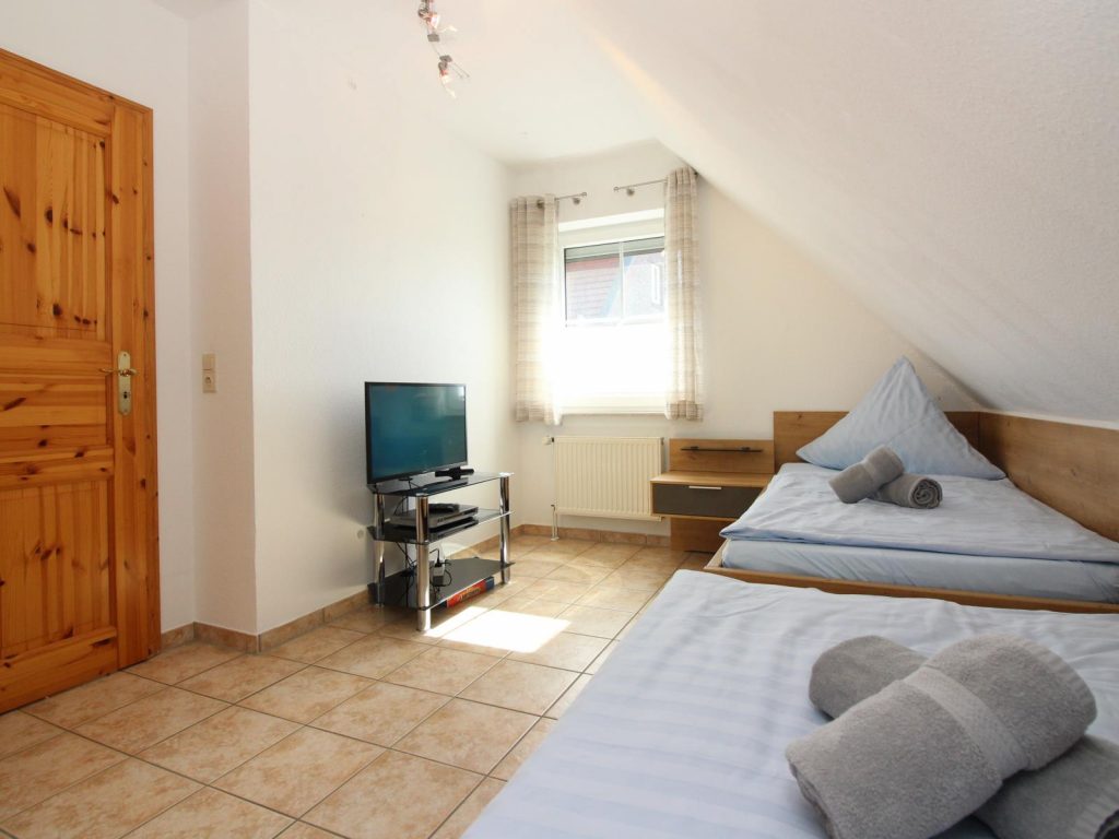 Haus Burhave - Schlafzimmer Einzelbetten 1